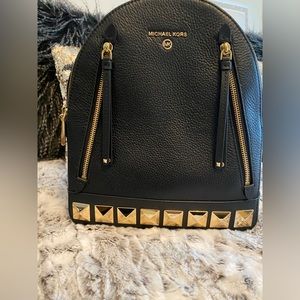 Black studded Michael Kors backpack